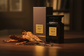 Tom Ford Tobacco Vanille lifestyle shot with tobacco and vanilla